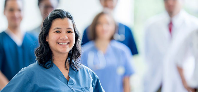 How do you become a registered nurse, and what education is required?